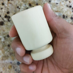 Quassia cups are typically made from the wood of the bitter ash tree (Simarouba amara), also known as quassia amara.